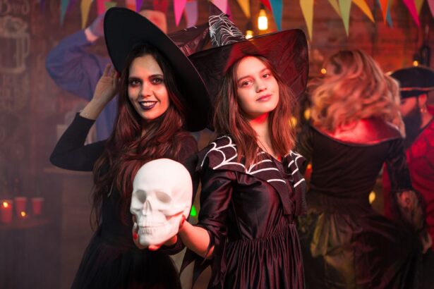 Portrait of two witches celebrating friendship at a halloween party